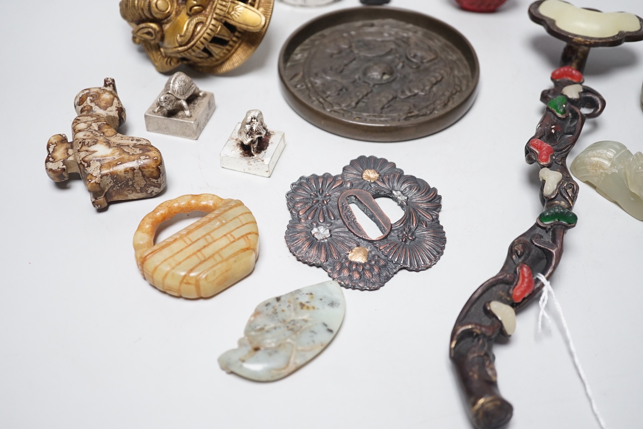 A selection of various Oriental items, including Chinese hardstone carvings, Japanese cast bronze mirror, snuff bottle, Japanese napkin ring etc.